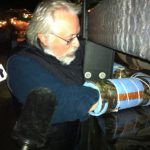 Leonard Higgins, a climate justice activist locks down to a megaload. Photo courtesy Portland Rising Tide.