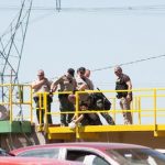Lane County Sheriff officers cut loose a protester locked down to a truck dump at Seneca’s Biomass Plant
