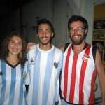 Argentine friends wear their national team jerseys on game day in Brazil. doherty (right) wears his training jersey of an Argentine club, Estudiantes de la Plata.