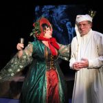 Tinamarie Ivey as the Ghost of Christmas Present and Robert Hirsh as Scrooge