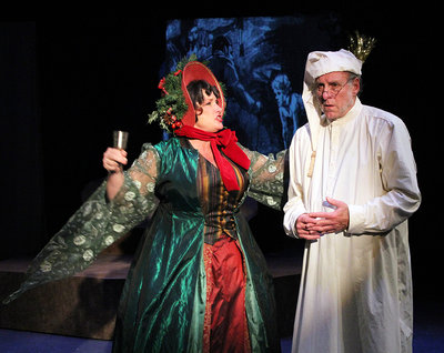 Tinamarie Ivey as the Ghost of Christmas Present and Robert Hirsh as Scrooge