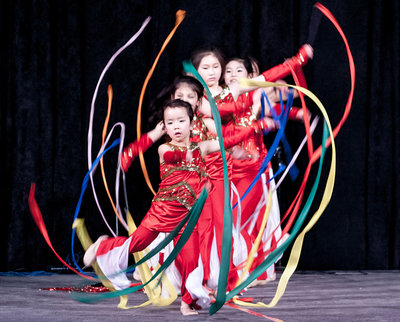Eugene Chinese School children’s dance troupe performing at the Asian Celebration.