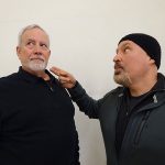 Beadle Bamford (David Gustafson, right) advises Judge Turpin (Jake Gardner) to get a shave during rehearsals for Eugene Opera’s upcoming production of Sweeney Todd. Photo by Ashley Hastings.