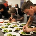 Belly owner and chef Brendan Mahaney prepares plates in the may 31 heat of Iron Chef Eugene. Photo courtesy LCC.