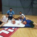 The author (far right) poses with some of his teammates