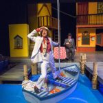 Tony rust (in boat) and mark allen in cottage theatre’s Scapino!