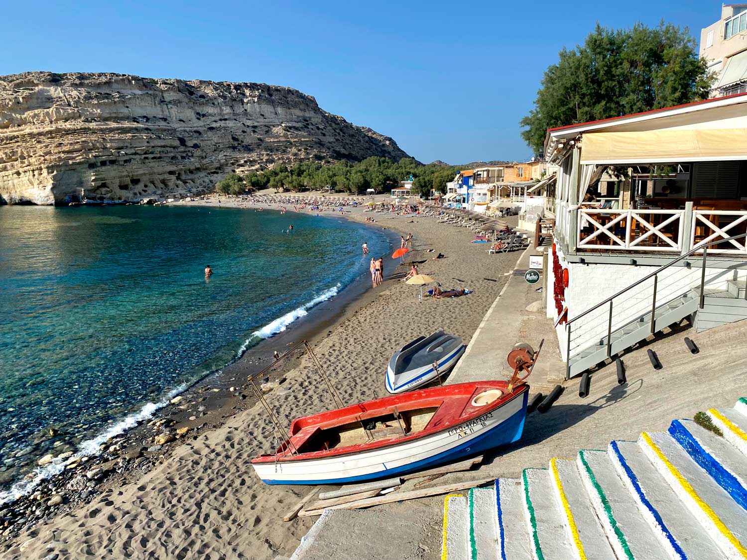 20250206greece-Matala-beach-with-tavernas-and-the-cliff-with-caves-once-used-by-hippies