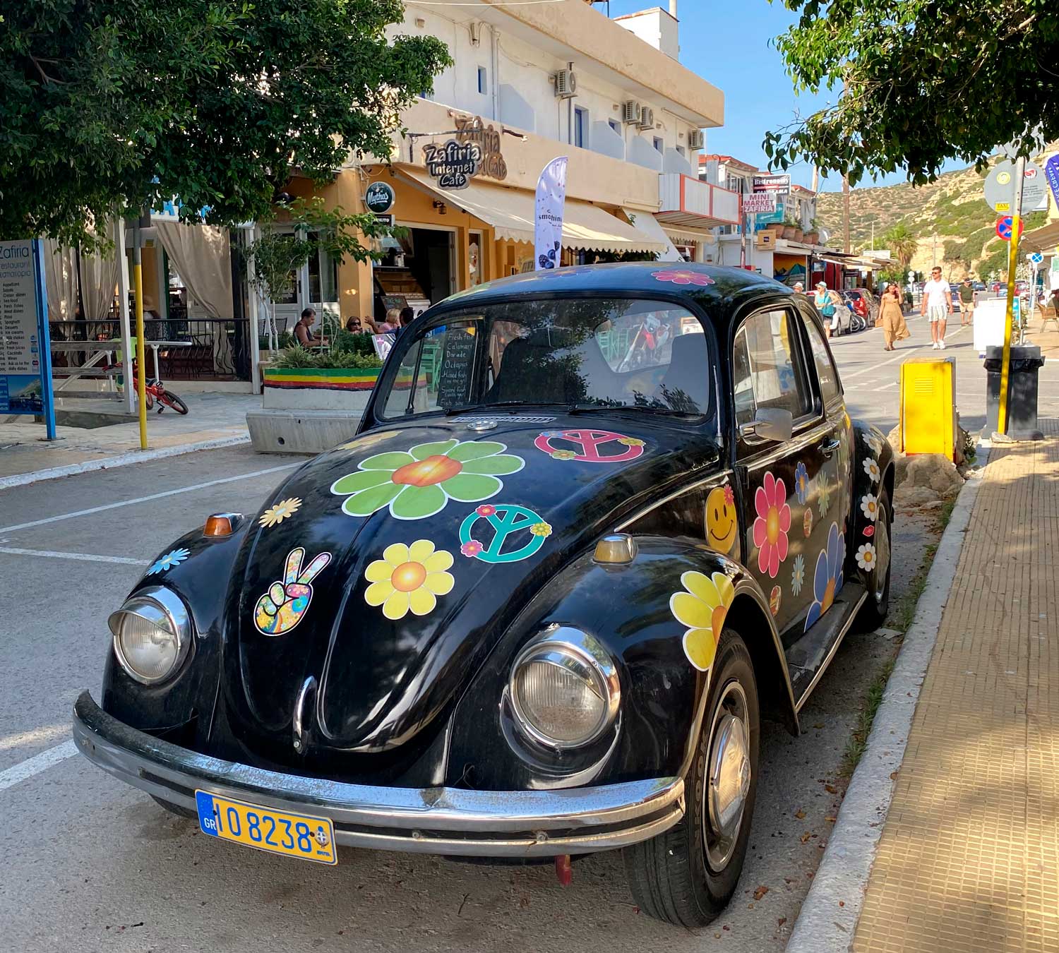 20250206greece-Matala-main-street-with-hippie-era-VW-bug